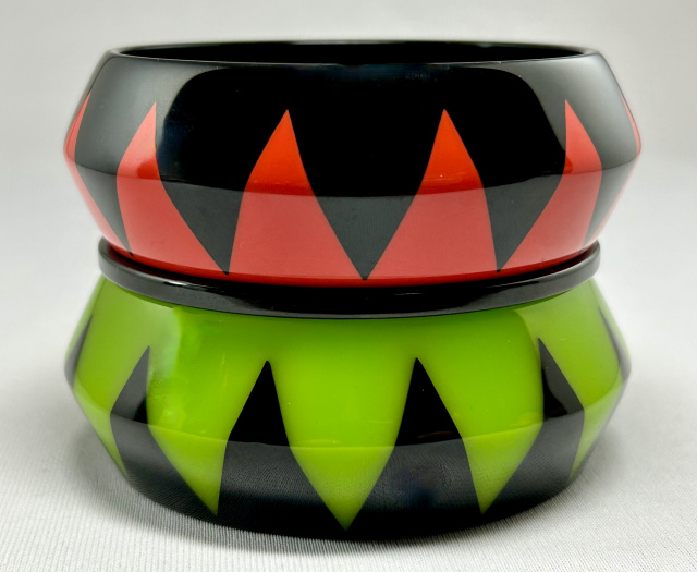 WT16 translucent green and orange with black claw resin bangles